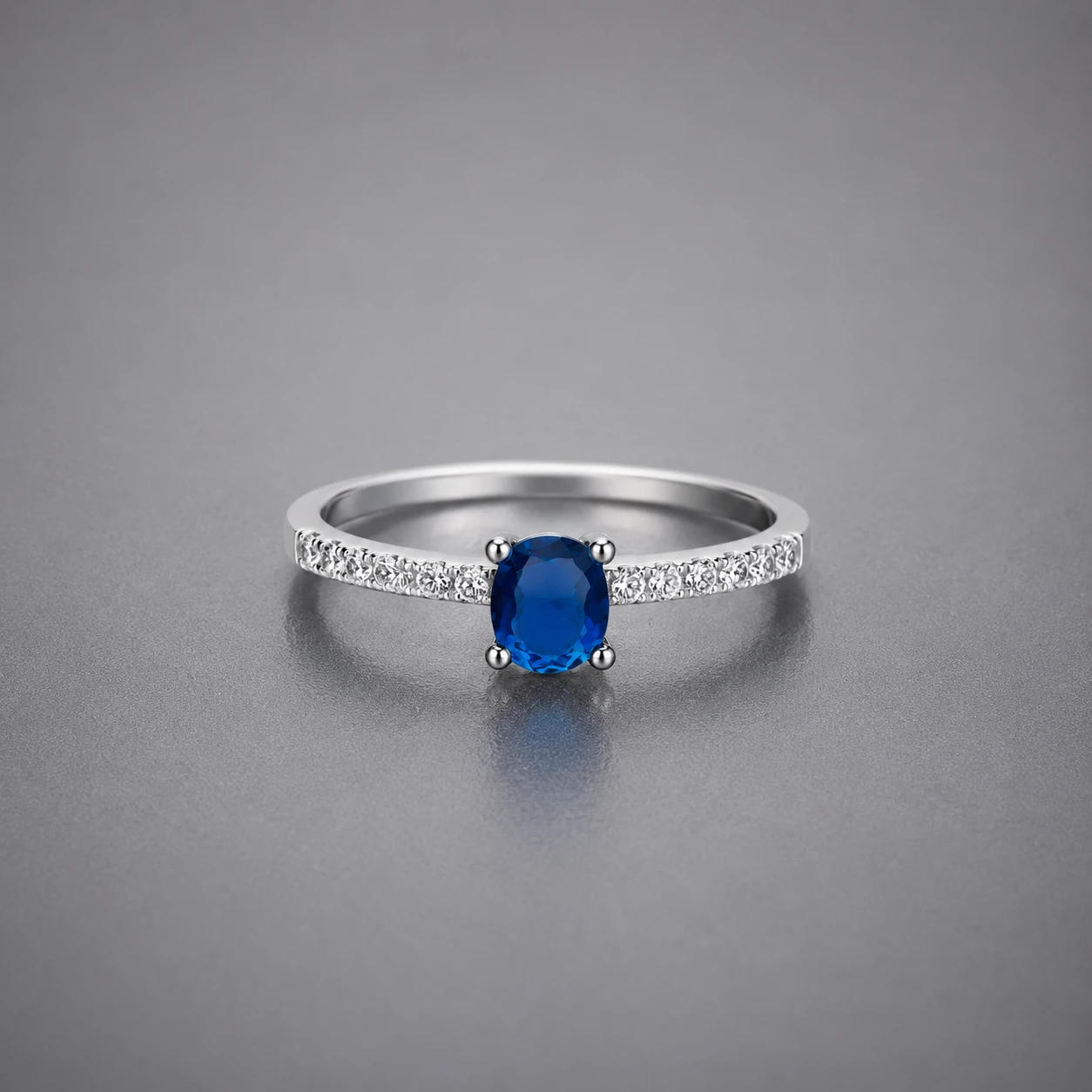 Oval Blue Sapphire Pavé Band Ring