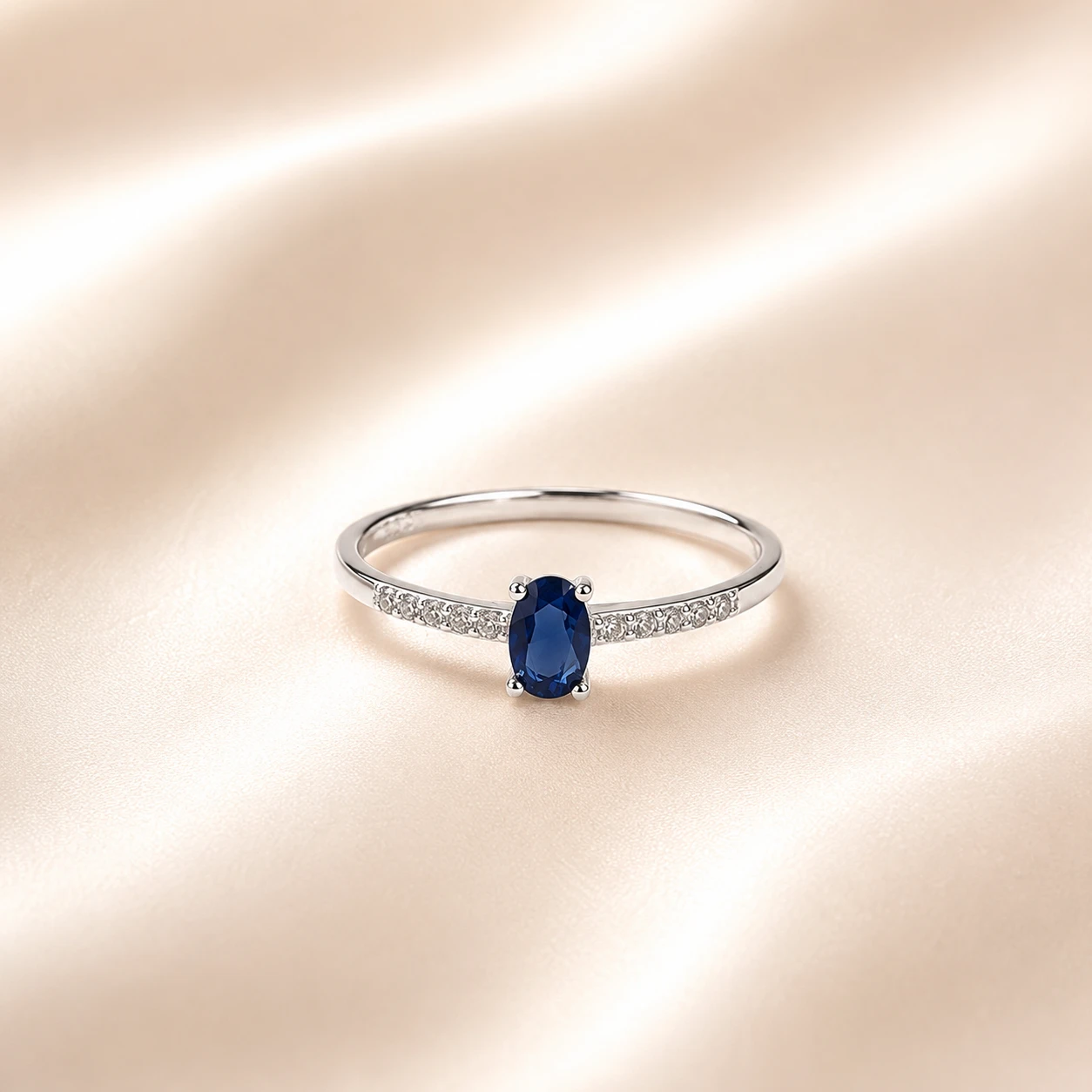 Oval Blue Sapphire Solitaire Accent Ring
