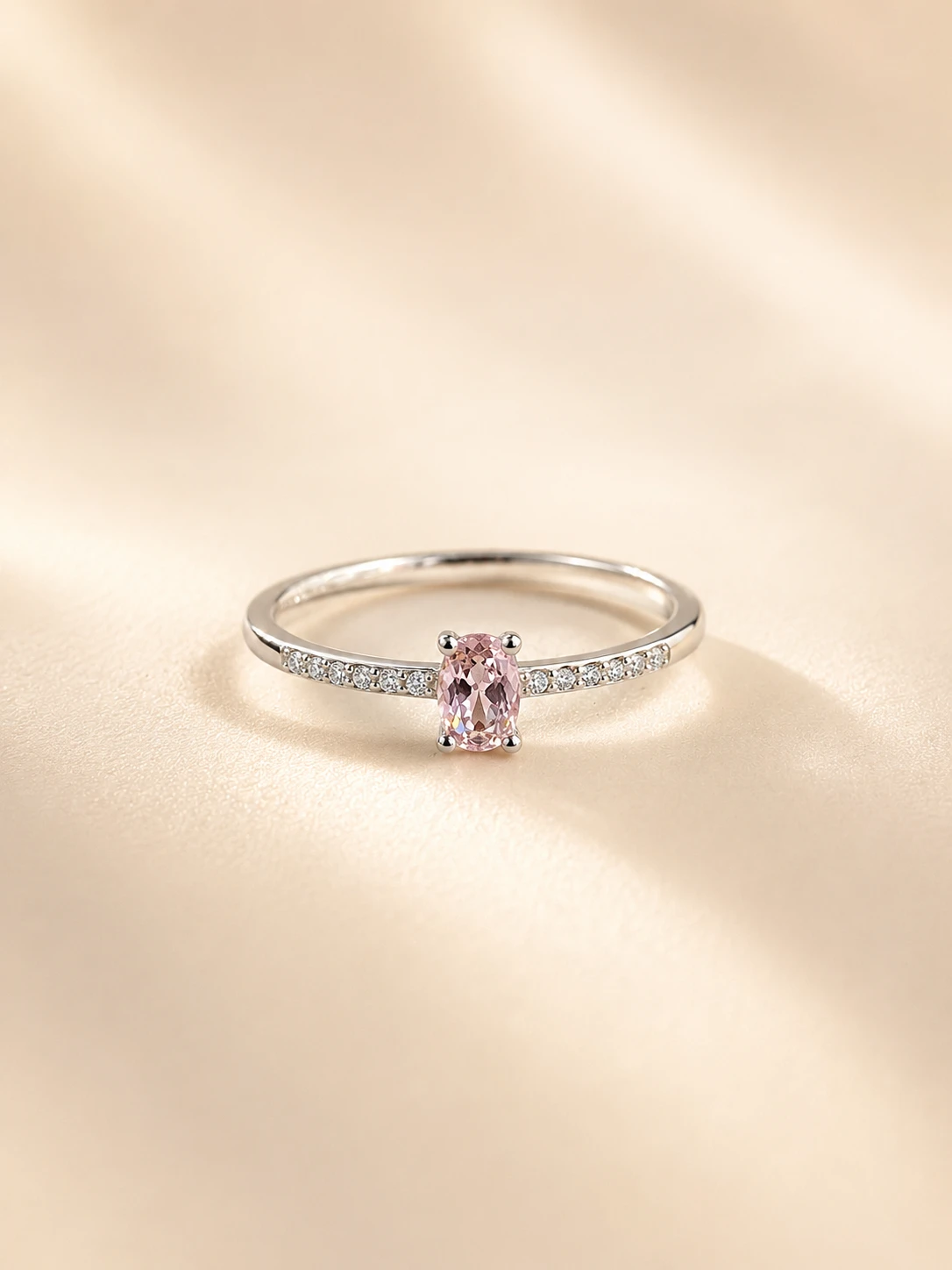Oval-Cut Pink Stone Solitaire Accent Ring